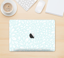 The Light Teal Blue & White Floral Sprout Skin Kit for the 12" Apple MacBook (A1534)