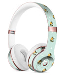 The Micro Daisy and Mint Polka Dot Pattern Full-Body Skin Kit for the Beats by Dre Solo 3 Wireless Headphones