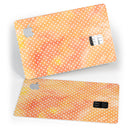The Orange Watercolor Grunge Surface with Polka Dots - Premium Protective Decal Skin-Kit for the Apple Credit Card