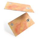 The Orange Watercolor Grunge Surface with Polka Dots - Premium Protective Decal Skin-Kit for the Apple Credit Card