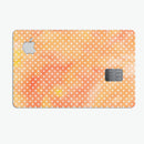 The Orange Watercolor Grunge Surface with Polka Dots - Premium Protective Decal Skin-Kit for the Apple Credit Card