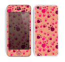 The Pink & Tan Paw Prints Skin for the Apple iPhone 5c