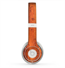 The Red Tinted WoodGrain Skin for the Beats by Dre Solo 2 Headphones