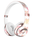 The Tiny Pink and Yellow hearts of a Whole Full-Body Skin Kit for the Beats by Dre Solo 3 Wireless Headphones