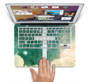 The Vector White Cross v2 over Cloudy Abstract Green Nebula Skin Set for the Apple MacBook Pro 15" with Retina Display