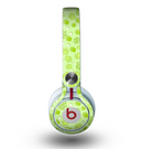 The Vibrant Green Paw Prints Skin for the Beats by Dre Mixr Headphones