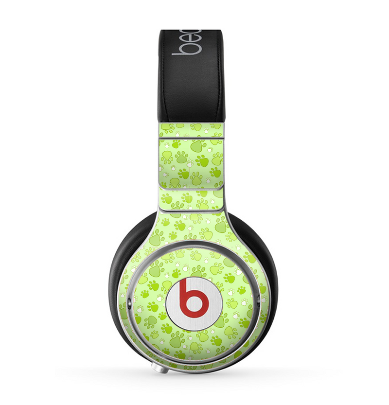 The Vibrant Green Paw Prints Skin for the Beats by Dre Pro Headphones