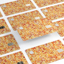 The Watercolor Orange and Red Snow Crystal - Premium Protective Decal Skin-Kit for the Apple Credit Card