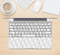 The White Studded Seamless Pattern Skin Kit for the 12" Apple MacBook (A1534)