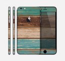 The Wooden Planks with Chipped Green and Brown Paint Skin for the Apple iPhone 6 Plus