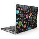 MacBook Pro with Touch Bar Skin Kit - Trick_or_Treat_Candy_Pattern-MacBook_13_Touch_V9.jpg?