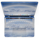 MacBook Pro with Touch Bar Skin Kit - Vivid_Blue_Reflective_Clouds_on_the_Horizon-MacBook_13_Touch_V4.jpg?