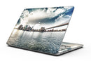Vivid_Cloudy_Sky_Over_The_City_Skyline_-_13_MacBook_Pro_-_V1.jpg