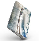 Vivid_Cloudy_Sky_Over_The_City_Skyline_-_13_MacBook_Pro_-_V2.jpg