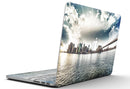 Vivid_Cloudy_Sky_Over_The_City_Skyline_-_13_MacBook_Pro_-_V5.jpg