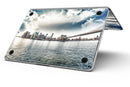 Vivid_Cloudy_Sky_Over_The_City_Skyline_-_13_MacBook_Pro_-_V8.jpg