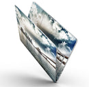 Vivid_Cloudy_Sky_Over_The_City_Skyline_-_13_MacBook_Pro_-_V9.jpg