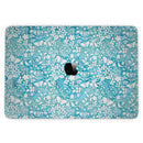 MacBook Pro without Touch Bar Skin Kit - White_Butterflies_and_Flowers_on_Blue_Watercolor_Pattern-MacBook_13_Touch_V6.jpg?