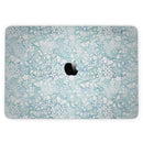 MacBook Pro without Touch Bar Skin Kit - White_Butterflies_and_Flowers_on_Light_Blue_Watercolor_Pattern-MacBook_13_Touch_V6.jpg?