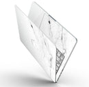 White_and_Black_Marble_Surface_-_13_MacBook_Pro_-_V9.jpg