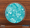 The Turquoise & White Paisley Skinned Foam-Backed Coaster Set