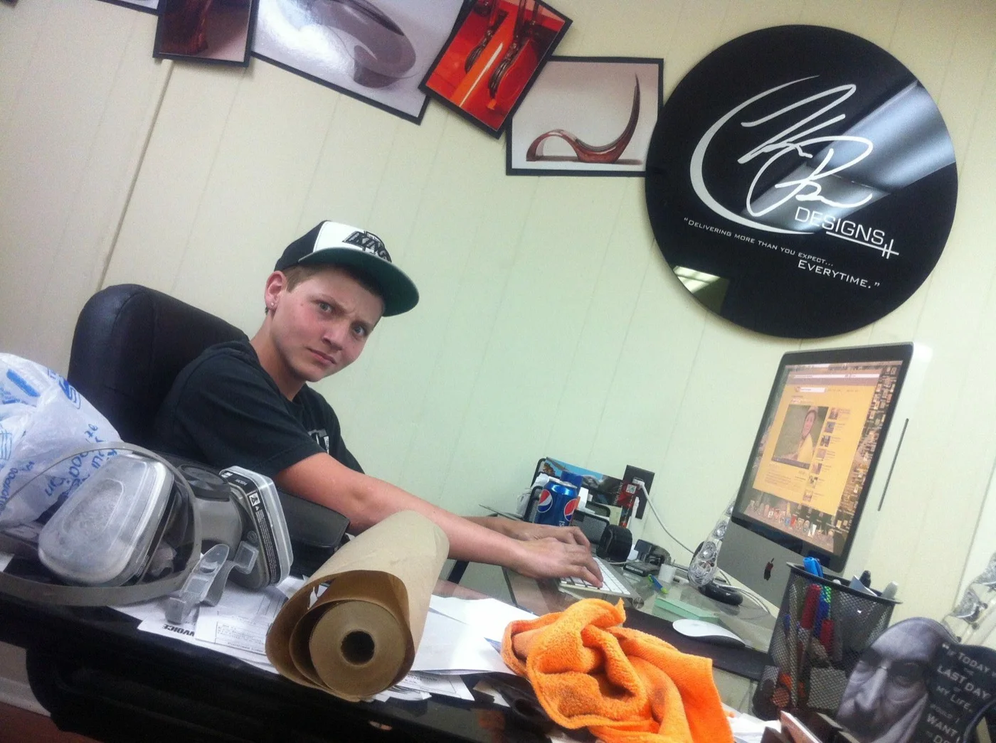 The very beginning — Austin at the desk in the first shop