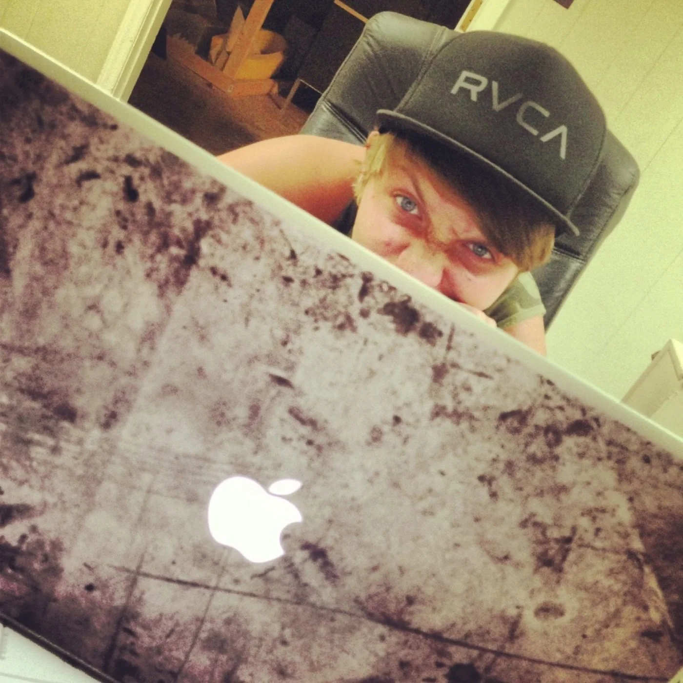 Behind a freshly skinned MacBook
